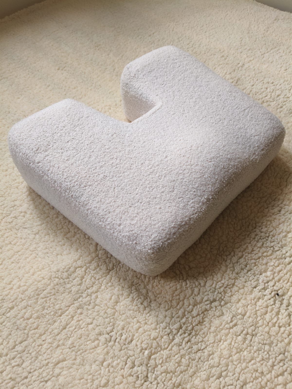 Coussin ergonomique coccyx PosturLabs avec sa découpe en U